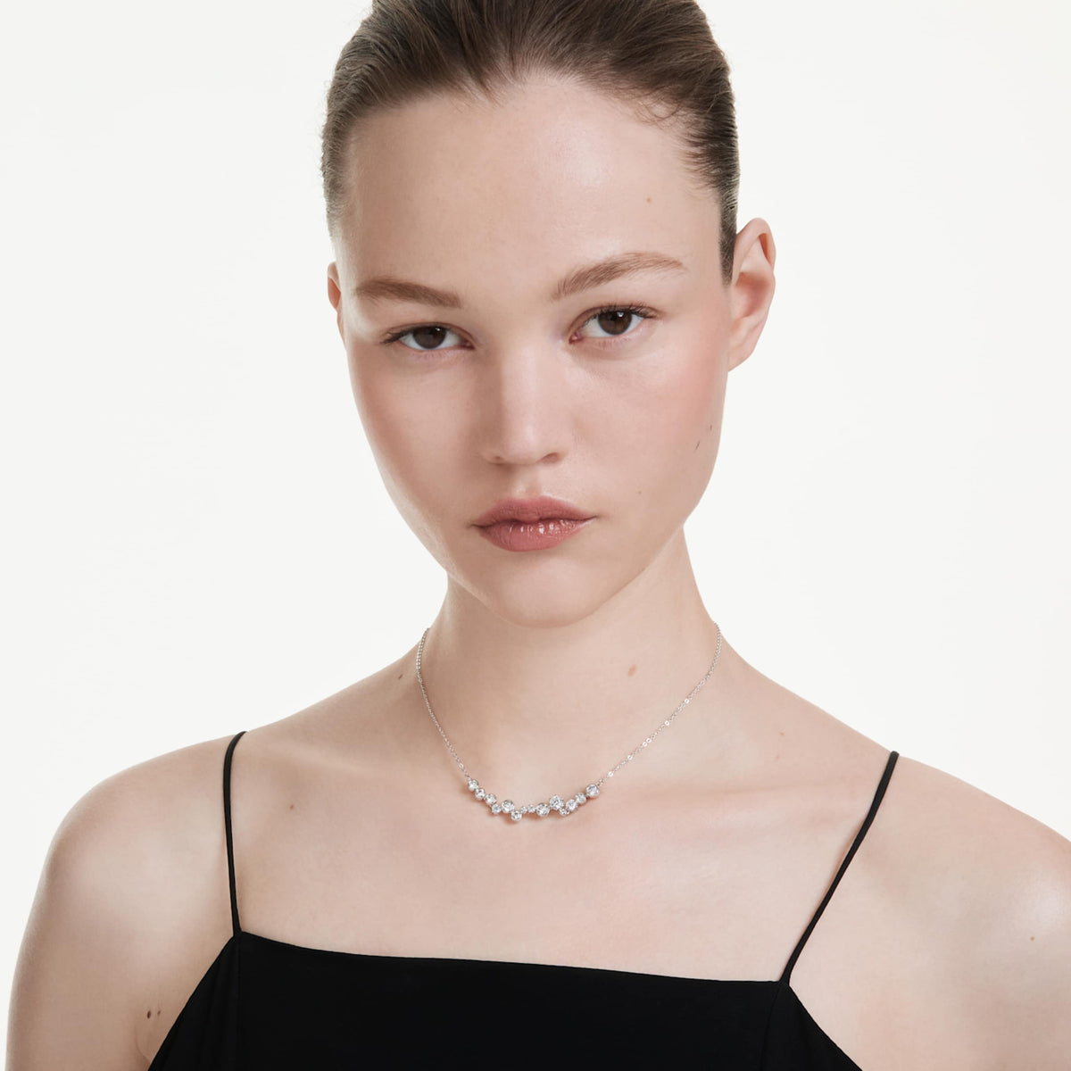 Swarovski Constella necklace with green mixed-cut accents and an 18K gold finish