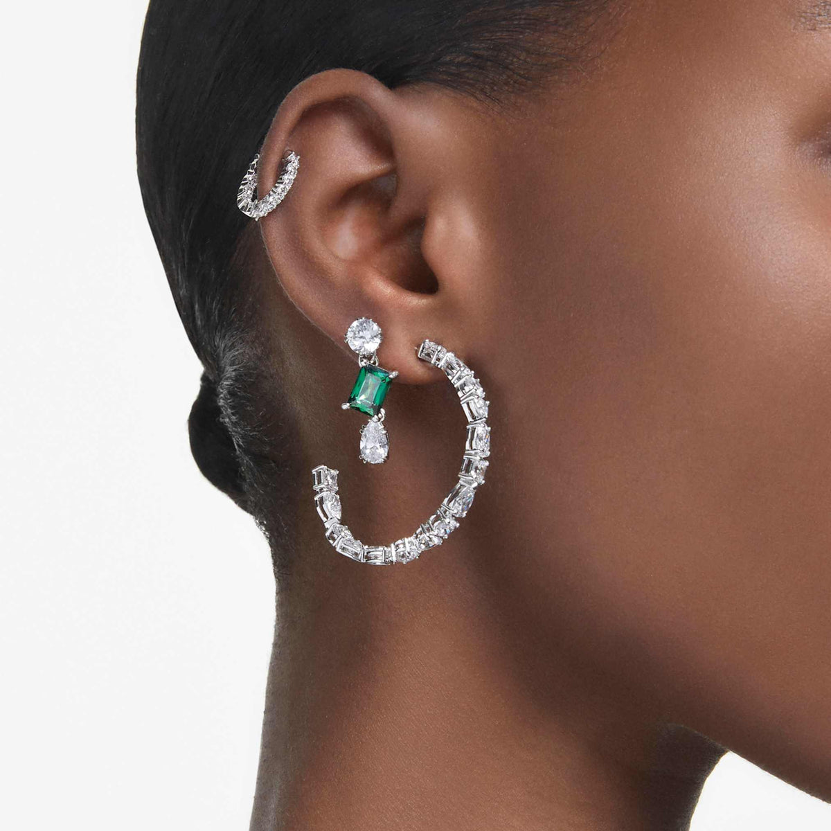 Swarovski Mesmera drop earrings with green mixed-cut accents and rhodium plating