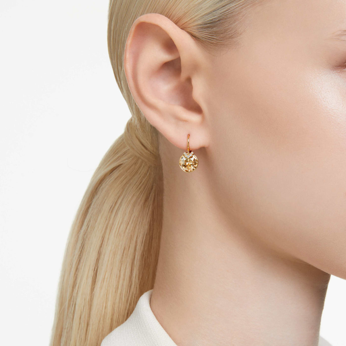 Swarovski Bella V drop earrings with blue round-cut accents and rhodium plating