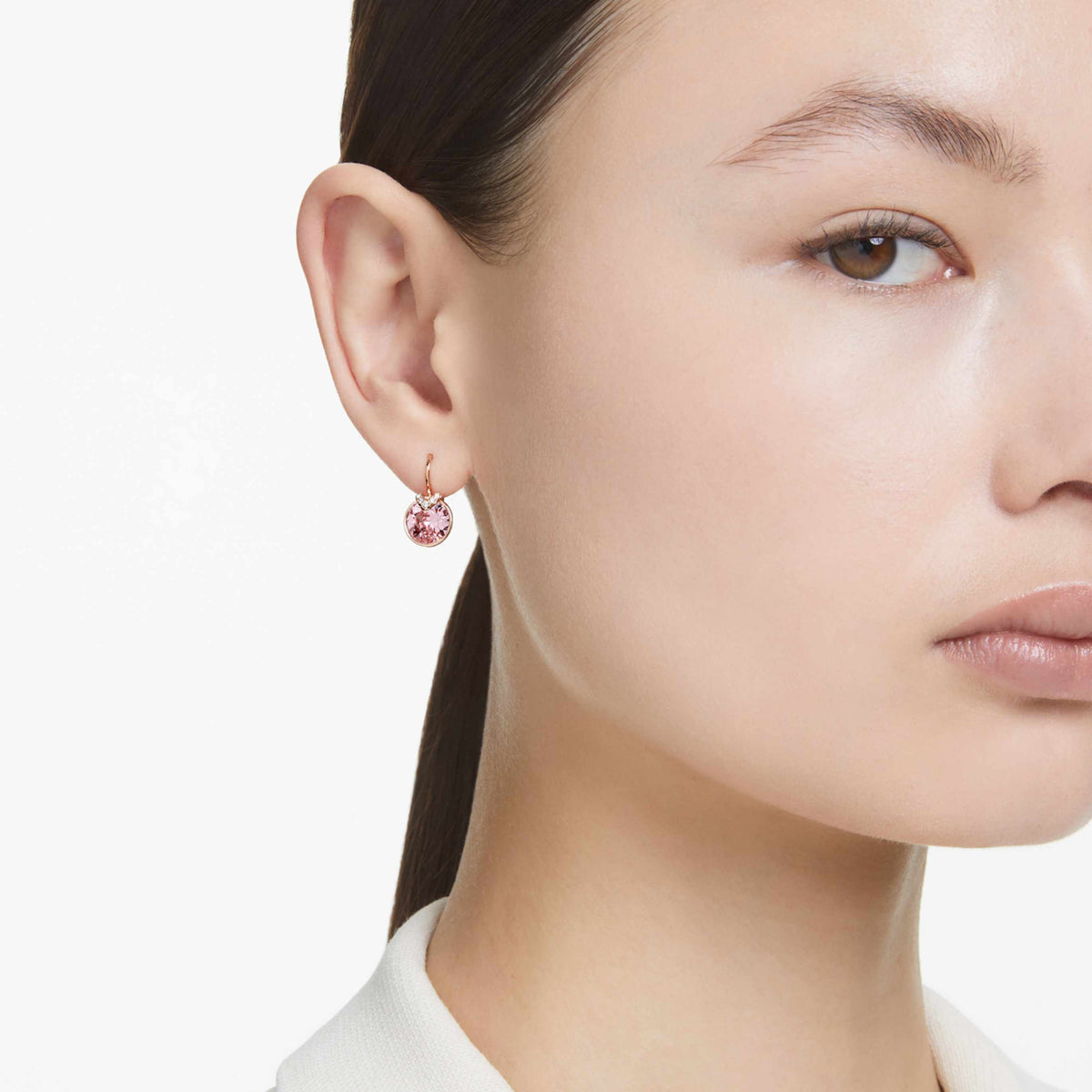 Swarovski Bella V drop earrings with pink round-cut accents and rhodium plating