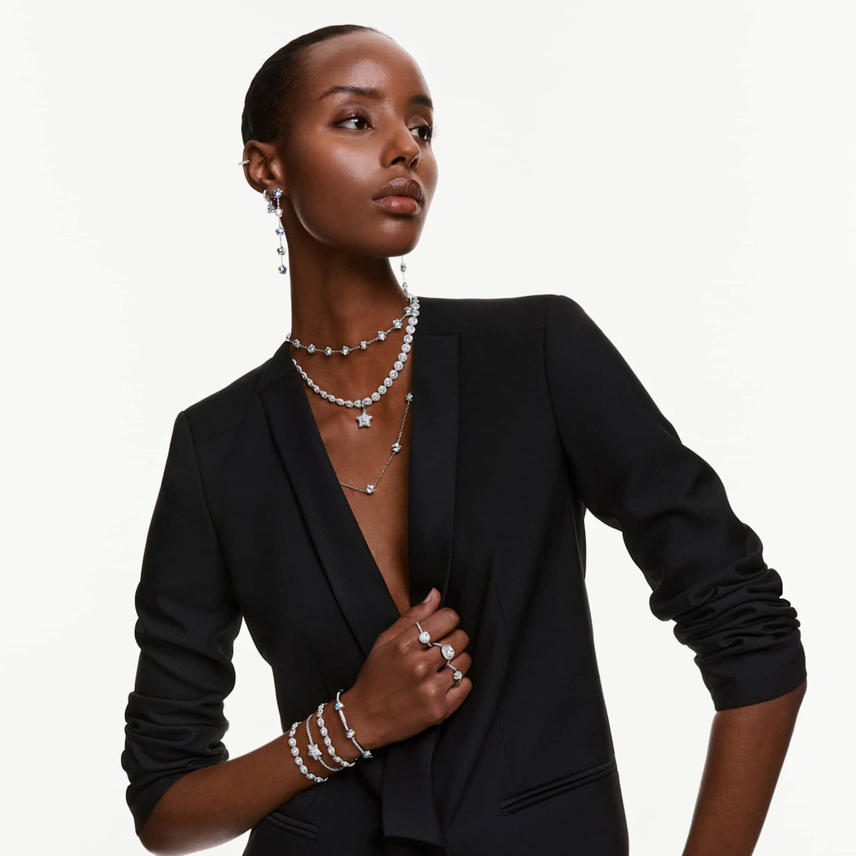 Swarovski Chroma drop earrings featuring a star motif with white mixed-cut accents and rhodium plating