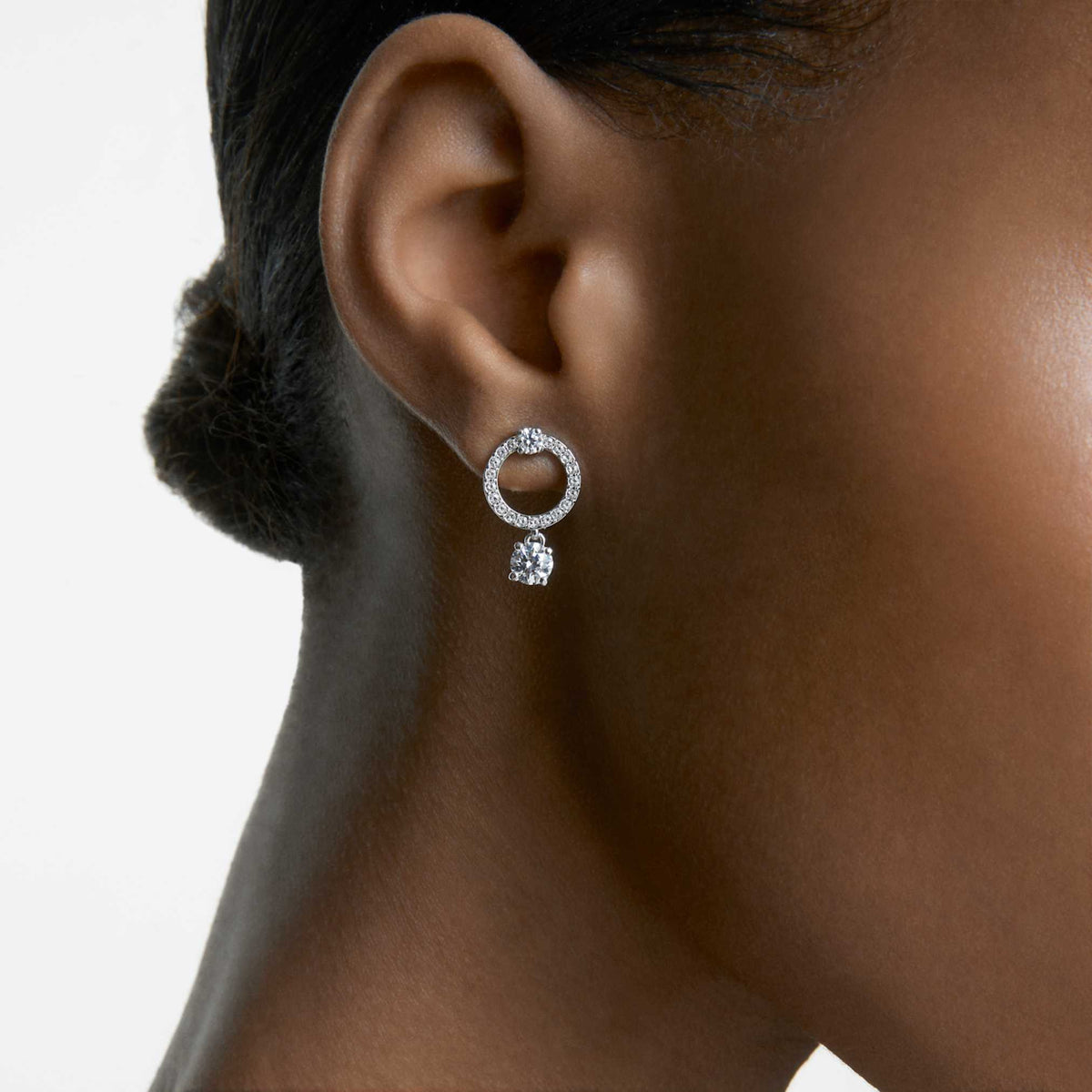 Swarovski Constella hoop earrings with white round-cut accents and rhodium plating