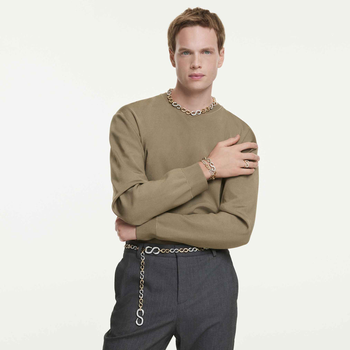 Swarovski Dextera open ring with white round-cut accents and an 18K gold finish