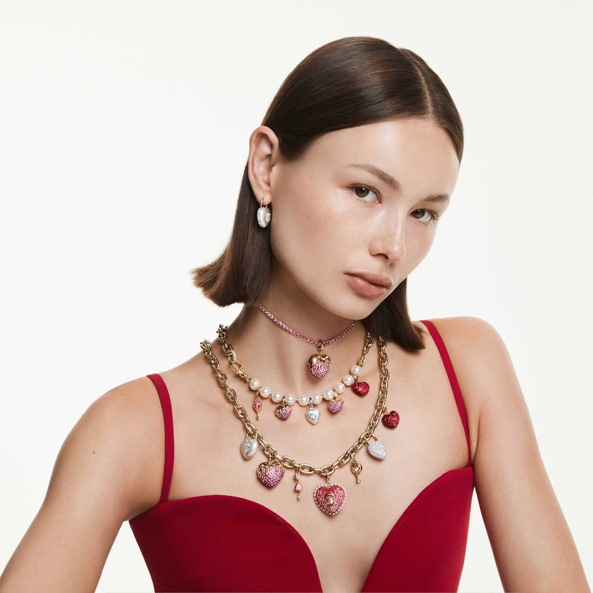 Swarovski Idyllia necklace featuring a heart motif with multicolored mixed-cut accents and an 18K gold finish