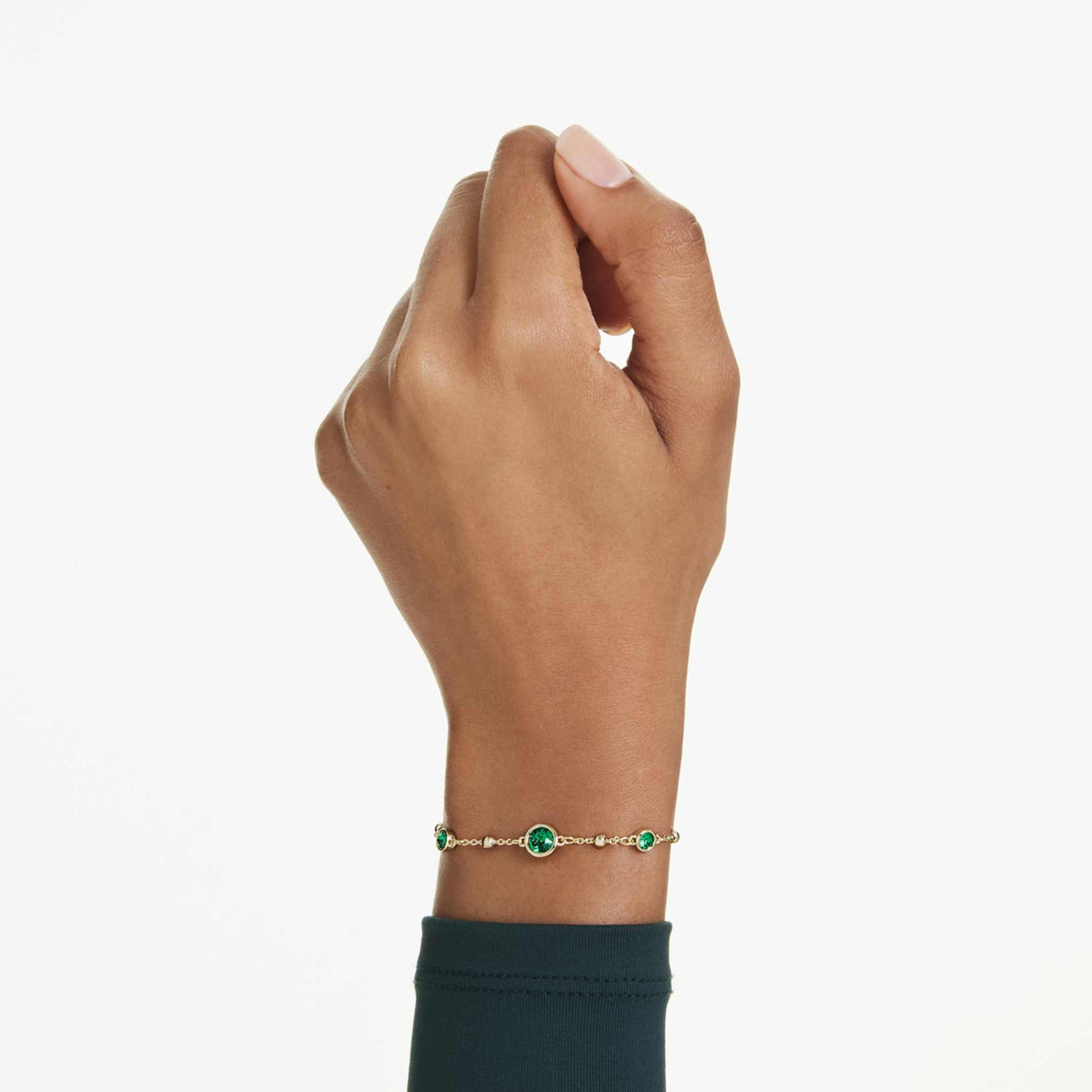Swarovski Imber bracelet with green round-cut accents and an 18K gold finish