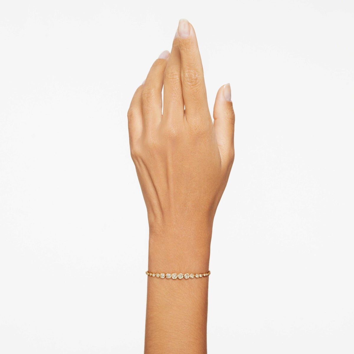 Swarovski Imber bracelet with blue round-cut accents and an 18K gold finish