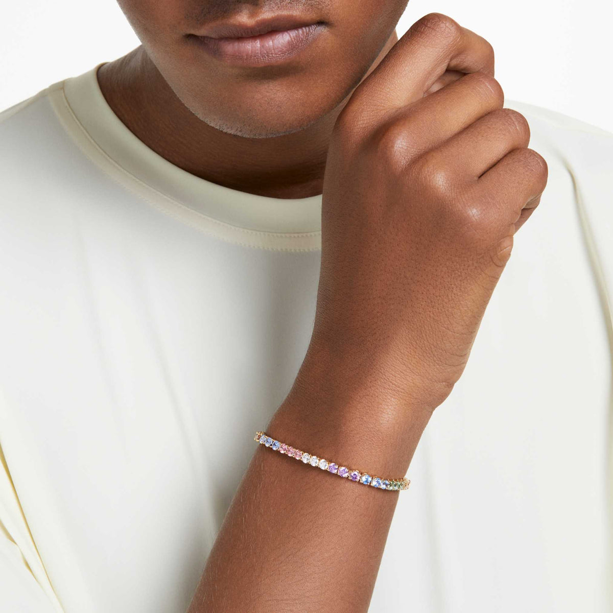 Swarovski Matrix Tennis bracelet with multicolored round-cut accents and an 18K gold finish