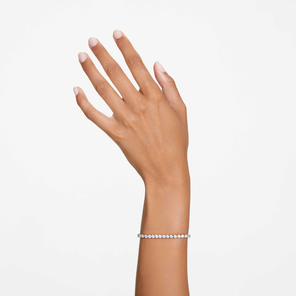 Swarovski Matrix Tennis bracelet with white round-cut accents and an 18K rose gold finish