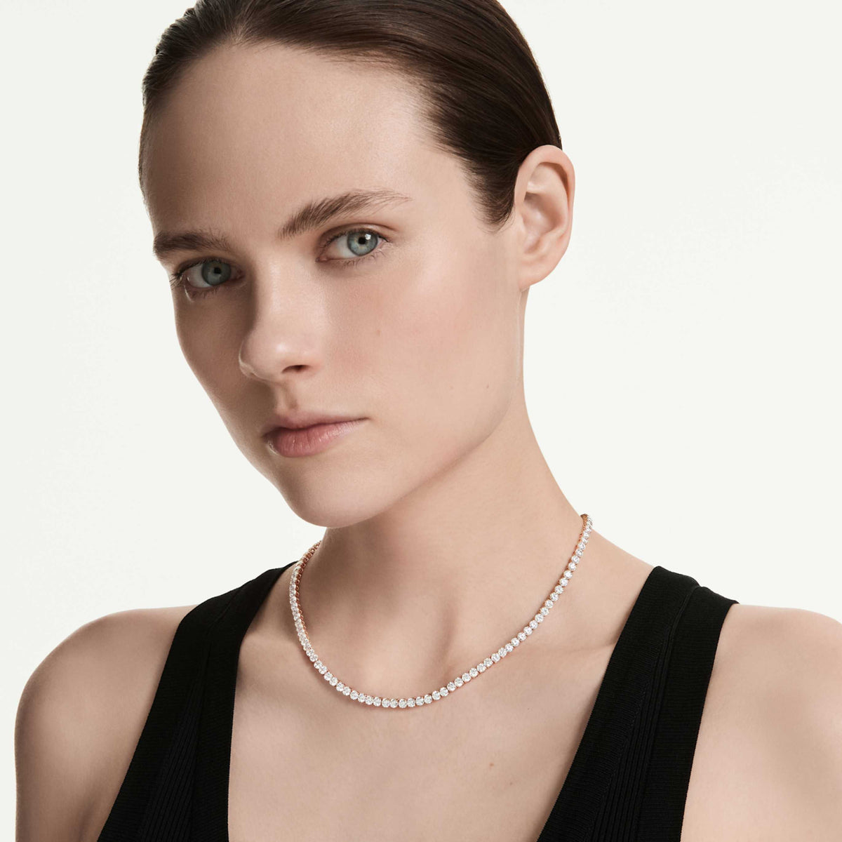 Swarovski Matrix Tennis necklace with pink round-cut accents and an 18K gold finish