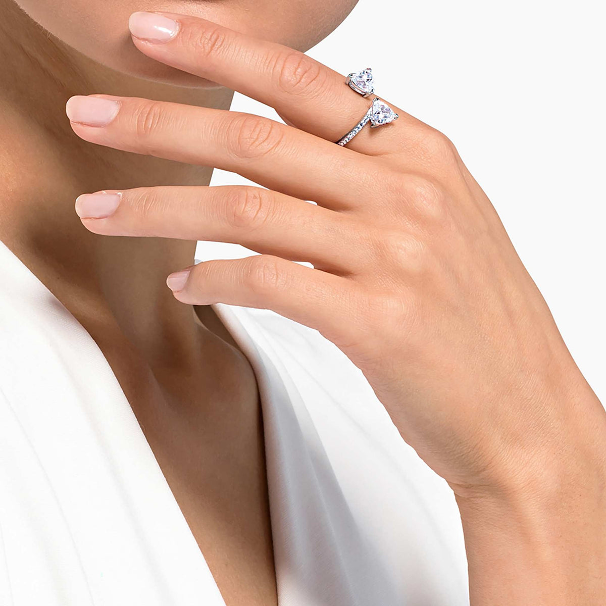 Swarovski Mesmera open ring with white heart-cut accents and rhodium plating