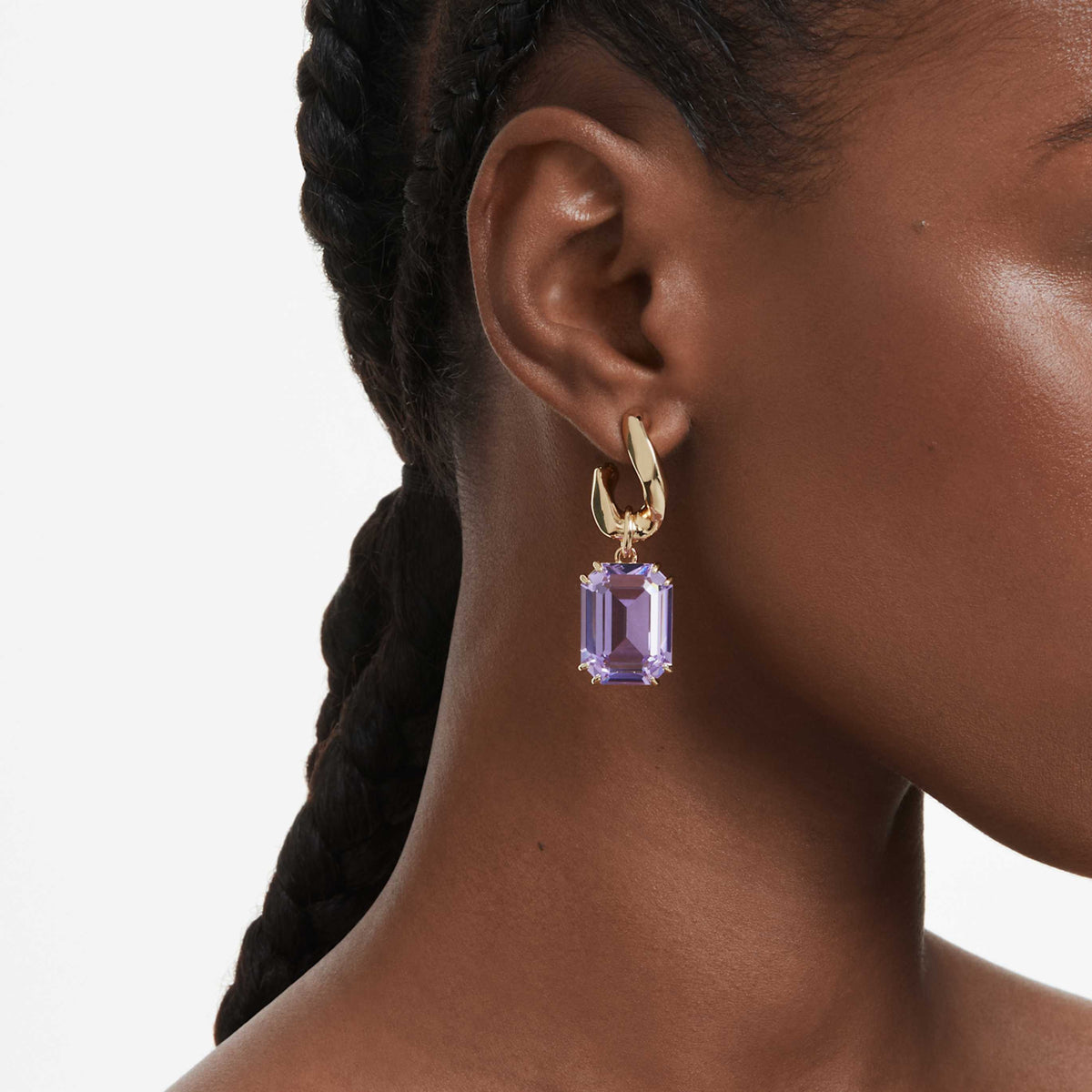 Swarovski Millenia drop earrings with green octagon-cut accents and an 18K gold finish