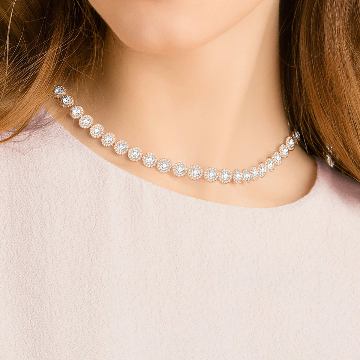 Swarovski Una Angelic necklace with white round-cut accents and an 18K gold finish