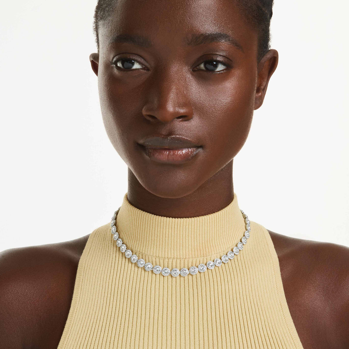 Swarovski Una Angelic necklace with white round-cut accents and an 18K gold finish