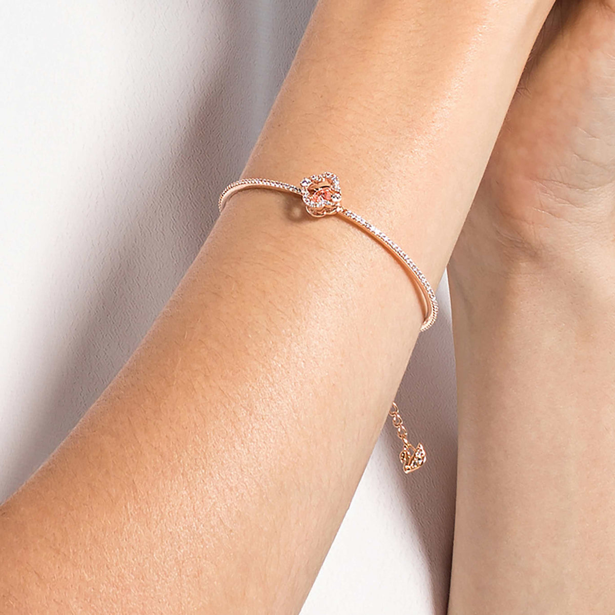 Swarovski Una Angelic bangle with green mixed-cut accents and rhodium plating